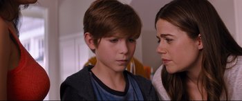 Movie still from “Good Boys” (2019), directed by Gene Stupnitsky – A woman and a young boy looking at each other; Close Up shot, Over the shoulder angle