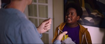 Movie still from “Good Boys” (2019), directed by Gene Stupnitsky – A young boy talking to an older man; Close Up shot, Over the shoulder angle