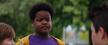 Movie still from “Good Boys” (2019), directed by Gene Stupnitsky – A person with a purple shirt; Close Up shot, Over the shoulder angle