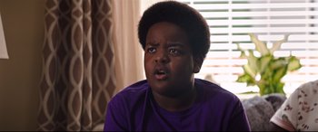 Movie still from “Good Boys” (2019), directed by Gene Stupnitsky – A young man with a surprised look on his face; Close Up shot, Over the shoulder angle
