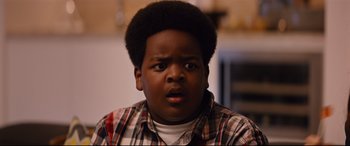 Movie still from “Good Boys” (2019), directed by Gene Stupnitsky – A young person with a surprised look on his face; Close Up shot, Over the shoulder angle