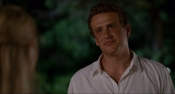 Movie still from “Forgetting Sarah Marshall” (2008), directed by Nicholas Stoller – A person wearing a white dress shirt; Close Up shot, Over the shoulder angle