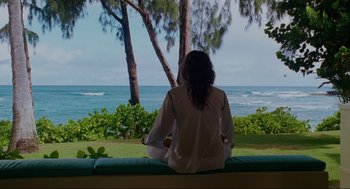 Movie still from “Forgetting Sarah Marshall” (2008), directed by Nicholas Stoller – A woman sitting on a bench looking out at the ocean; Wide shot, High angle