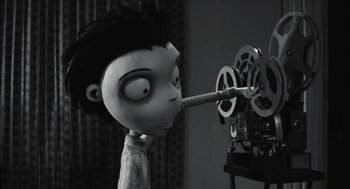 Movie still from “Frankenweenie” (2012), directed by Tim Burton – A black and white photo of a movie projector; Medium shot, High angle