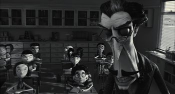 Movie still from “Frankenweenie” (2012), directed by Tim Burton – A black and white photo of a classroom scene; Medium shot, Over the shoulder angle