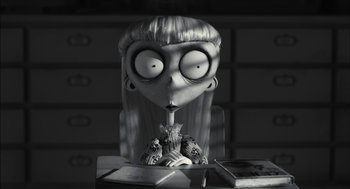Movie still from “Frankenweenie” (2012), directed by Tim Burton – A black - and - white photo of a cartoon character; Close Up shot, High angle
