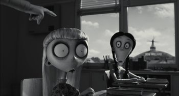 Movie still from “Frankenweenie” (2012), directed by Tim Burton – A couple of people sitting at a table; Medium shot, Over the shoulder angle