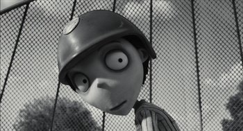 Movie still from “Frankenweenie” (2012), directed by Tim Burton – A black and white image of a person with a helmet on; Close Up shot, Low angle