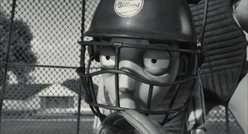 Movie still from “Frankenweenie” (2012), directed by Tim Burton – The face of a baseball catcher; Close Up shot, Low angle