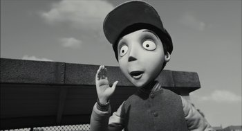 Movie still from “Frankenweenie” (2012), directed by Tim Burton – A black - and - white photo of a cartoon character; Medium shot, Low angle