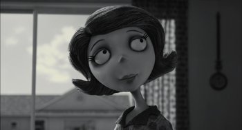 Movie still from “Frankenweenie” (2012), directed by Tim Burton – A black and white image of a cartoon character; Close Up shot, Over the shoulder angle