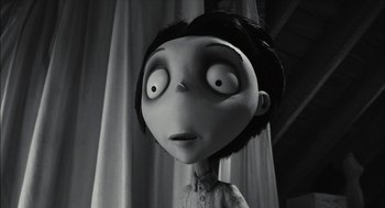 Movie still from “Frankenweenie” (2012), directed by Tim Burton – The head of a doll with eyes wide open; Close Up shot, Low angle