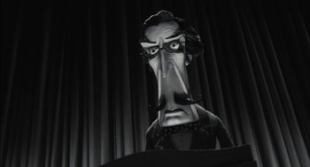 Movie still from “Frankenweenie” (2012), directed by Tim Burton – A black - and - white photo of a man with a long nose; Close Up shot, Low angle