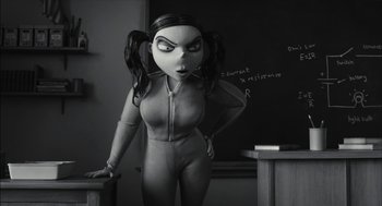 Movie still from “Frankenweenie” (2012), directed by Tim Burton – An animated character is standing in front of a chalkboard; Medium shot, Over the shoulder angle