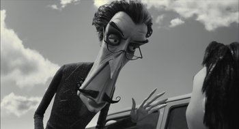 Movie still from “Frankenweenie” (2012), directed by Tim Burton – A black and white photo of a man with a strange face; Close Up shot, Low angle