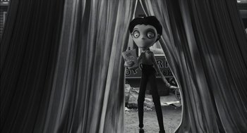 Movie still from “Frankenweenie” (2012), directed by Tim Burton – A black - and - white photo of a character from frankenweenie; Wide shot, Low angle