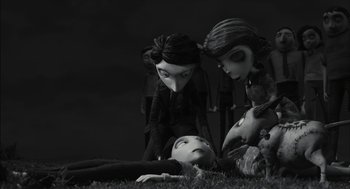 A group of people that are laying on the ground