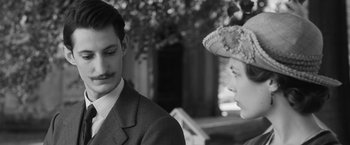 Movie still from “Frantz” (2016), directed by François Ozon – A man and a woman are talking to each other; Close Up shot, Over the shoulder angle