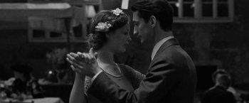 Movie still from “Frantz” (2016), directed by François Ozon – A black and white photo of a man and a woman dancing; Close Up shot, Low angle