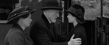 Movie still from “Frantz” (2016), directed by François Ozon – An older man and a young woman are talking; Close Up shot, Over the shoulder angle