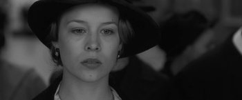 Movie still from “Frantz” (2016), directed by François Ozon – A person wearing a hat; Close Up shot, Over the shoulder angle
