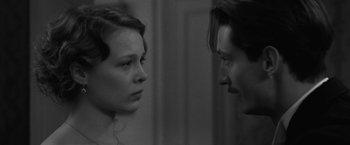 Movie still from “Frantz” (2016), directed by François Ozon – A man and a woman face to face in front of each other; Close Up shot, Over the shoulder angle