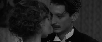 Movie still from “Frantz” (2016), directed by François Ozon – A man and a woman face to face in a black and white photo; Close Up shot, Over the shoulder angle