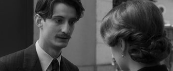 Movie still from “Frantz” (2016), directed by François Ozon – A man and a woman talking to each other; Close Up shot, Over the shoulder angle