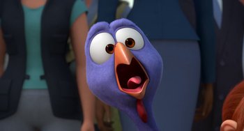 Movie still from “Free Birds” (2013), directed by Jimmy Hayward – A cartoon bird's face with its mouth open; Close Up shot, High angle
