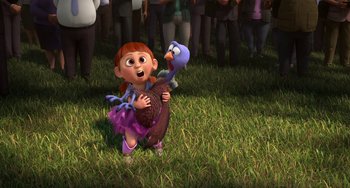 Movie still from “Free Birds” (2013), directed by Jimmy Hayward – A girl holding an object in her hands; Wide shot, High angle