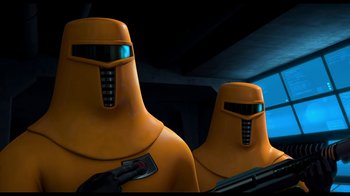 Movie still from “Free Birds” (2013), directed by Jimmy Hayward – A couple of people that are standing up in a room; Medium shot, Low angle