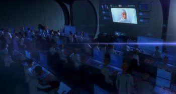 Movie still from “Free Birds” (2013), directed by Jimmy Hayward – A group of people sitting in front of computer screens; Extreme Wide shot, High angle