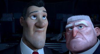 Movie still from “Free Birds” (2013), directed by Jimmy Hayward – Two cartoon characters in a room with a wall in the background; Close Up shot, Low angle