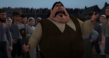 Movie still from “Free Birds” (2013), directed by Jimmy Hayward – A man with a mustache standing in front of a group of people; Medium shot, Over the shoulder angle