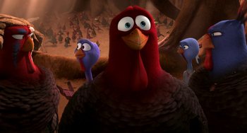 Movie still from “Free Birds” (2013), directed by Jimmy Hayward – A group of birds standing next to each other in a field; Close Up shot, High angle