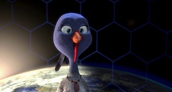 Movie still from “Free Birds” (2013), directed by Jimmy Hayward – An animated bird is standing in front of a space background; Close Up shot, High angle