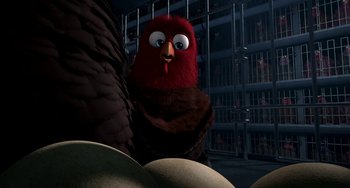 Movie still from “Free Birds” (2013), directed by Jimmy Hayward – An animated bird with a red head and a black beak; Close Up shot, High angle