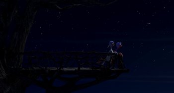Movie still from “Free Birds” (2013), directed by Jimmy Hayward – Two people sitting on top of a bridge at night; Extreme Wide shot, High angle