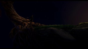 Movie still from “Free Birds” (2013), directed by Jimmy Hayward – A person sitting on a hill at night; Extreme Wide shot, Low angle