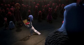 Movie still from “Free Birds” (2013), directed by Jimmy Hayward – A bunch of turkeys are in a room with a person holding a book; Wide shot, High angle