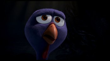 Movie still from “Free Birds” (2013), directed by Jimmy Hayward – A bird's face in the dark; Close Up shot, High angle