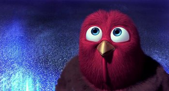 Movie still from “Free Birds” (2013), directed by Jimmy Hayward – A red bird with blue eyes and a gold beak; Close Up shot, Low angle