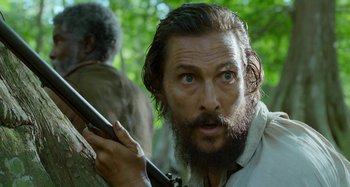 Movie still from “Free State of Jones” (2016), directed by Gary Ross – A person holding a gun; Close Up shot, Low angle