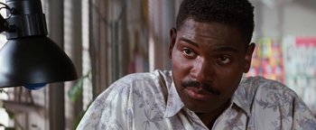 Movie still from “Free Willy” (1993), directed by Simon Wincer – A person wearing a white shirt; Close Up shot, Low angle