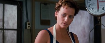 Movie still from “Free Willy” (1993), directed by Simon Wincer – A person with short brown hair; Close Up shot, Over the shoulder angle