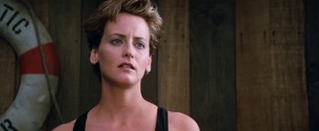 Movie still from “Free Willy” (1993), directed by Simon Wincer – A person with short brown hair; Close Up shot, Low angle