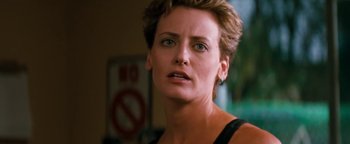 Movie still from “Free Willy” (1993), directed by Simon Wincer – A person with short brown hair; Close Up shot, Over the shoulder angle