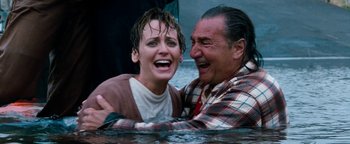 Movie still from “Free Willy” (1993), directed by Simon Wincer – A man and a woman in the water; Medium shot, High angle