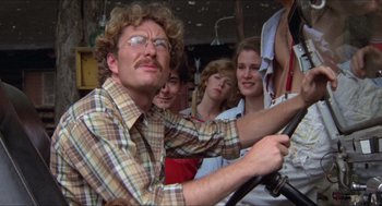 Movie still from “Friday the 13th” (1980), directed by Sean S. Cunningham – A group of people riding in a vehicle; Close Up shot, Low angle