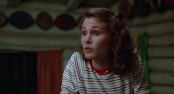 Movie still from “Friday the 13th” (1980), directed by Sean S. Cunningham – A young woman sitting in front of a window; Close Up shot, Over the shoulder angle